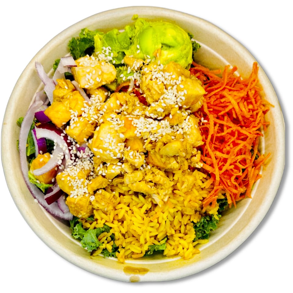 A vibrant Salad Fox bowl with chicken, rice, avocado, shredded carrots, red onion, and sesame seeds.